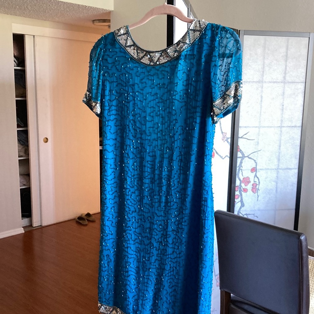 Evening dress with silver beads beautifully zipper in the back backless V shape
